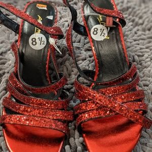 Red glitter stillettos